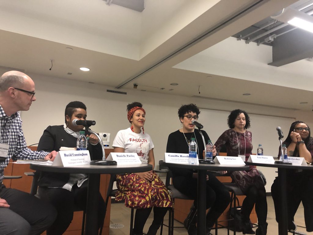 image of the panel of scholars attending the University of Michigan RacismLab symposium